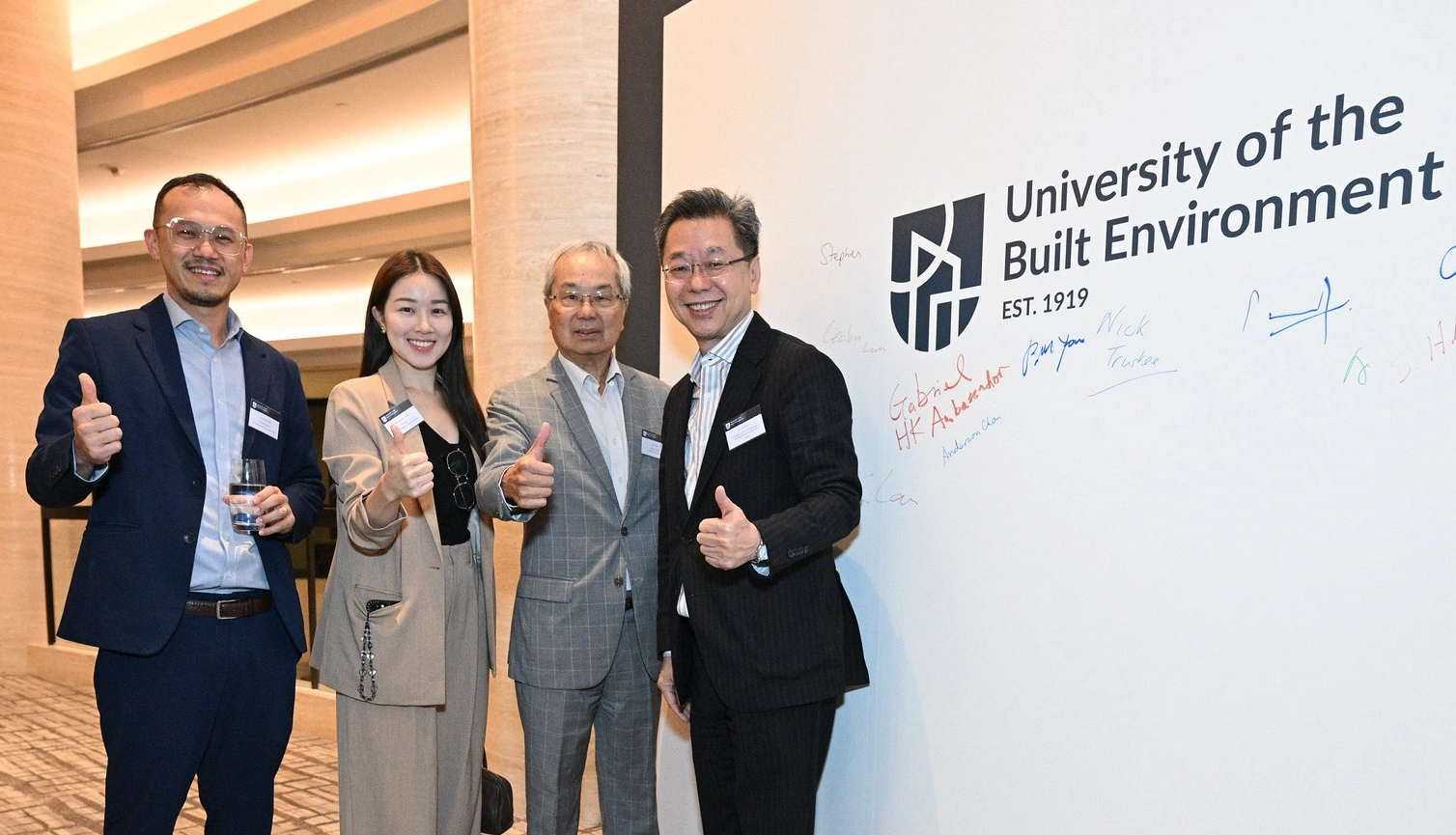 Networking and Celebrating - University of the Built Environment Name Launch HK